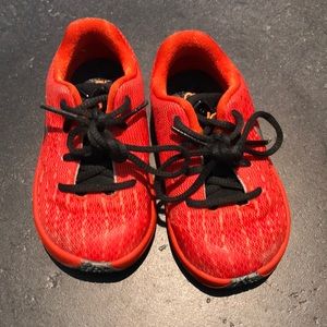 Orange Nike toddler tennis shoes